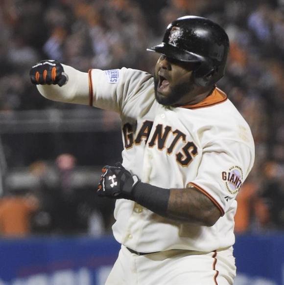 Pablo Sandoval celebra.