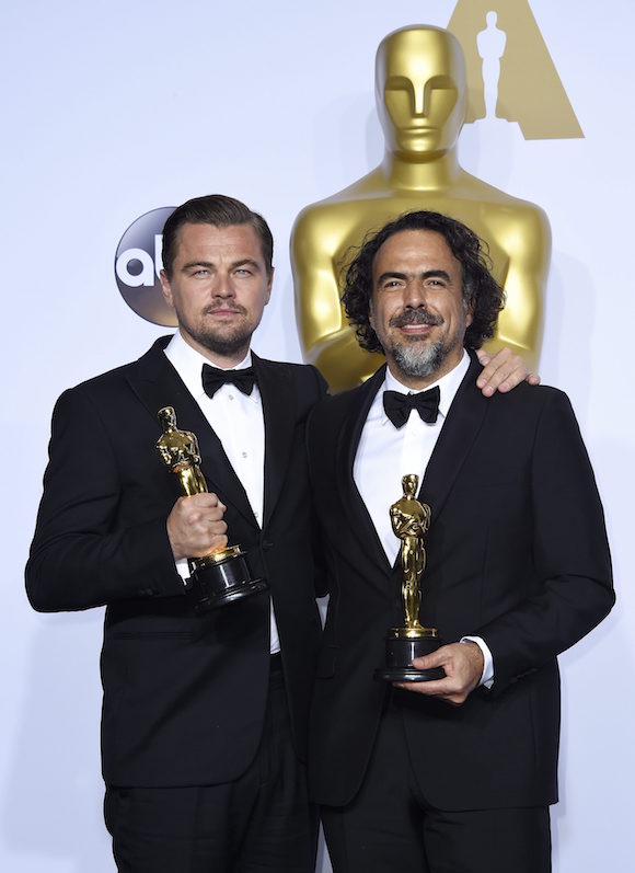 DiCaprio e I&ntilde;&aacute;rritu felices con sus &Oacute;scar al mejor actor y director, respectivamente.