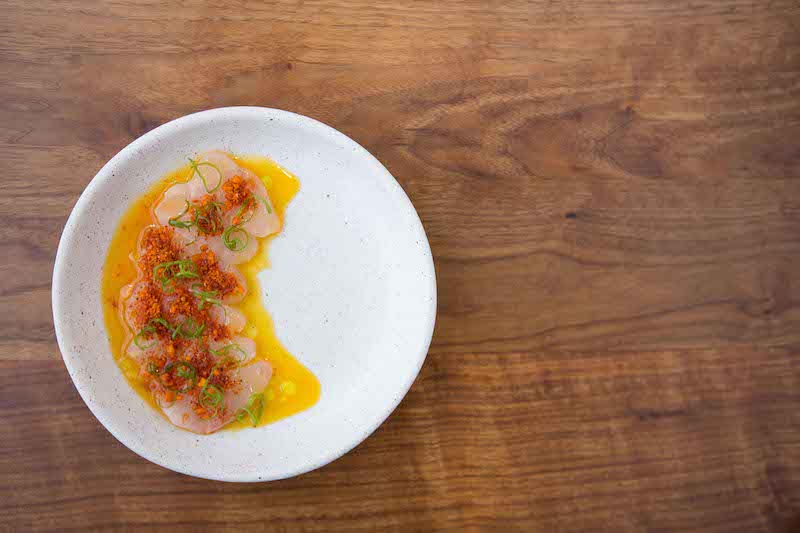 Ceviche de Pescado inspirado en los productos emblema de la provincia costanera de Manab&iacute;: man&iacute;, maracuy&aacute;, aj&iacute; y achiote. Foto: Kathryn M. Sheldon.