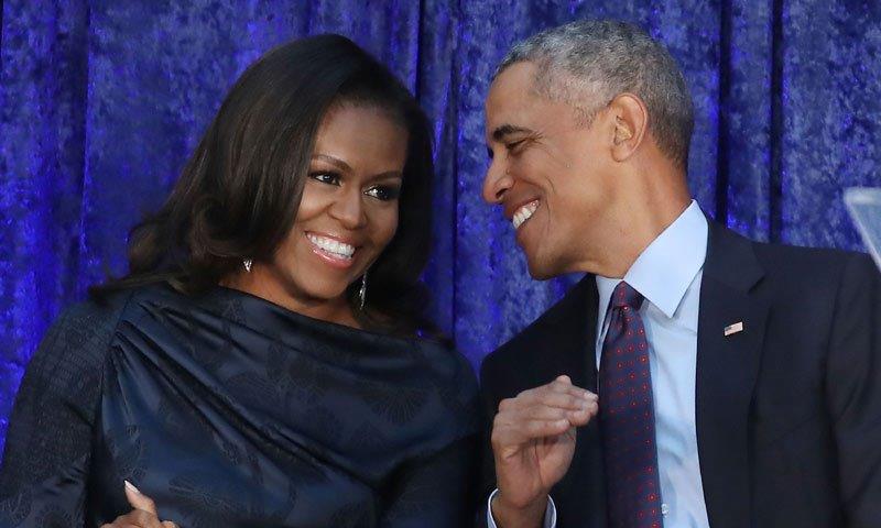 Michelle y Barack durante una cena en un asador madrile&ntilde;o