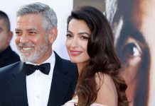 Fotografía de archivo fechada el 7 de junio de 2018 que muestra al actor estadounidense George Clooney (i) y su esposa, Amal Clooney, a su llegada a la gala de entrega del 46º premio a la carrera profesional que entrega el Instituto de Cine Americano (AFI) en el teatro The Dolby Theatre de Hollywood, California