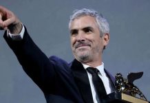 Alfonso Cuarón con su León e Oro 2018
