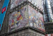 Una menina gigante observa Times Square desde el mural de Zapata detalle del mural que pintó el artista español Domingo Zapata en Times Square.