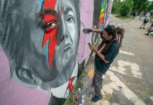 Grafitero dominicano planta cara al coronavirus en los muros de Berlín El artista callejero dominicano Jesús Cruz Artiles