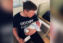 Elon Musk con su hijo