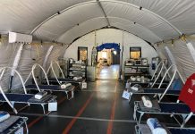 ONG abre un hospital para COVID-19 en un campamento fronterizo de migrantes