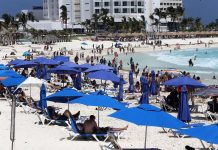 Quintana Roo recibe oleada de turistas pese al temor al covid-19 turistas