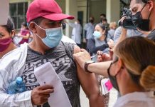 migrantes vacunados