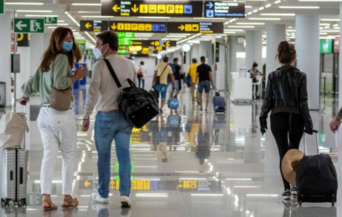 Viajeros estadounidenses en temporada navideña Viajeros