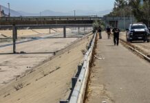 Personal de la Guardia Nacional (GN) y de la Policía Municipal resguardan la zona donde se localizaron dos cuerpos sin vida (1)