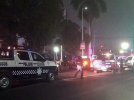 Miembros de la Policía Estatal resguardan la zona donde se registró un ataque armado
