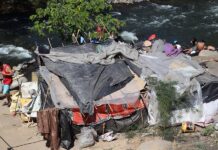 Aumenta inseguridad para migrantes en orillas de río entre Guatemala y México migrantes