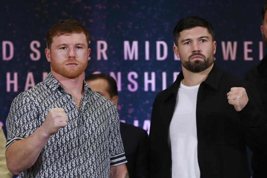 El mexicano Saúl Canelo Álvarez y el británico Jonh Ryder El mexicano Saúl Canelo Álvarez y el británico Jonh Ryder