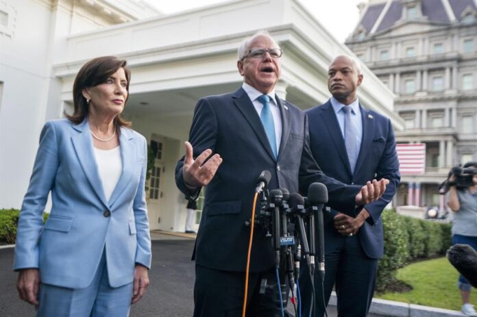 Tim Walz (C), New York Governor Kathy Hochul (L) and Maryland Governor Wes Moore Tim Walz (C), New York Governor Kathy Hochul (L) and Maryland Governor Wes Moore