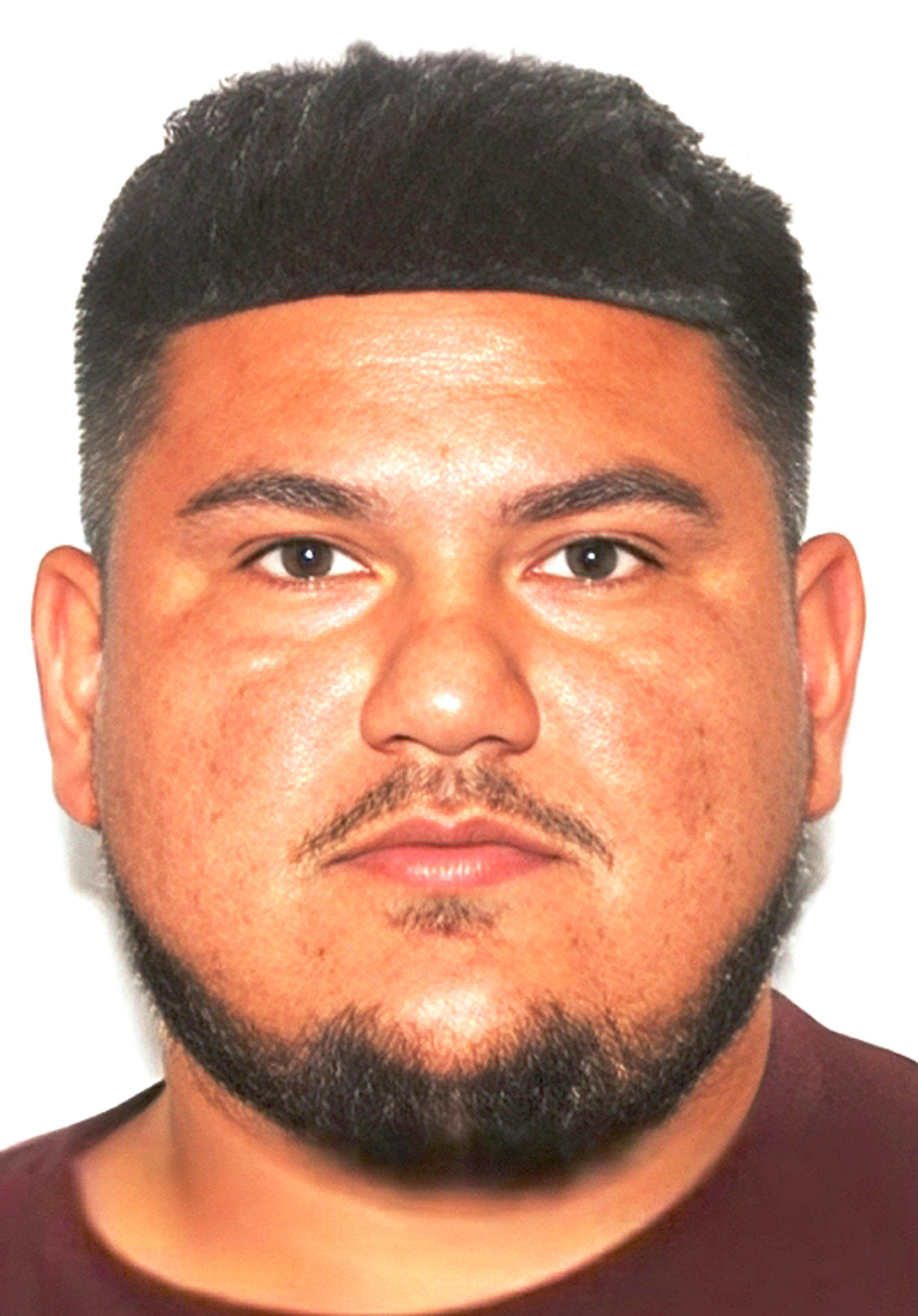 Heriberto Callejas, de 26 a&ntilde;os, arrestado y acusado de los delitos de asalto agravado con arma al disparar a Manuel Milan&eacute;s.