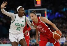 Nicole Enabosi of Nigeria (L) and Diana Taurasi of USA
