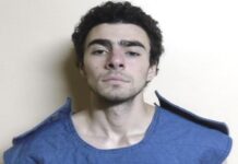 Booking Photo of Healthcare CEO Murder Suspect Luigi Mangione