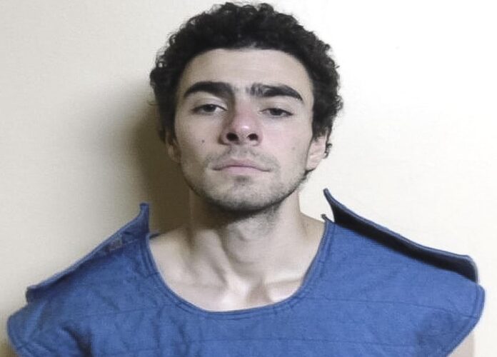 Booking Photo of Healthcare CEO Murder Suspect Luigi Mangione Booking Photo of Healthcare CEO Murder Suspect Luigi Mangione
