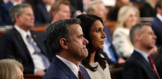 ohn Ratcliffe (L) and Director of National Intelligence Tulsi Gabbard