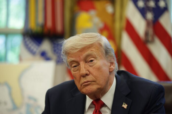 US President Trump signs executive orders in the Oval Office Trump