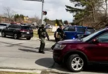 Police respond to a shooting at the Temple Israel in West Bloomfield, Michigan