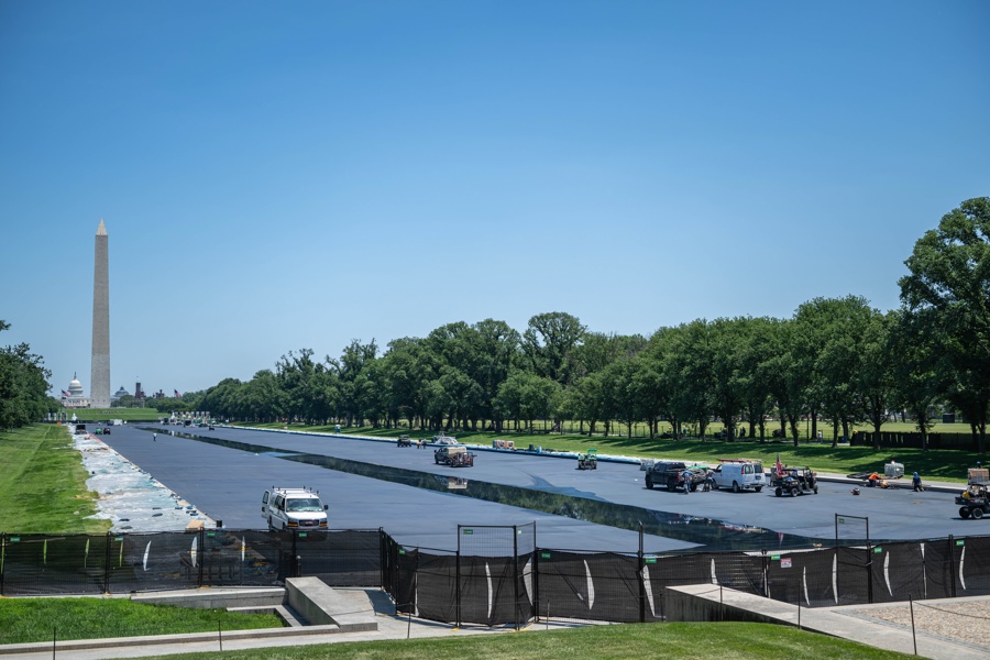 Workers resurface the Lincoln Memorial Reflecting Pool in DC
