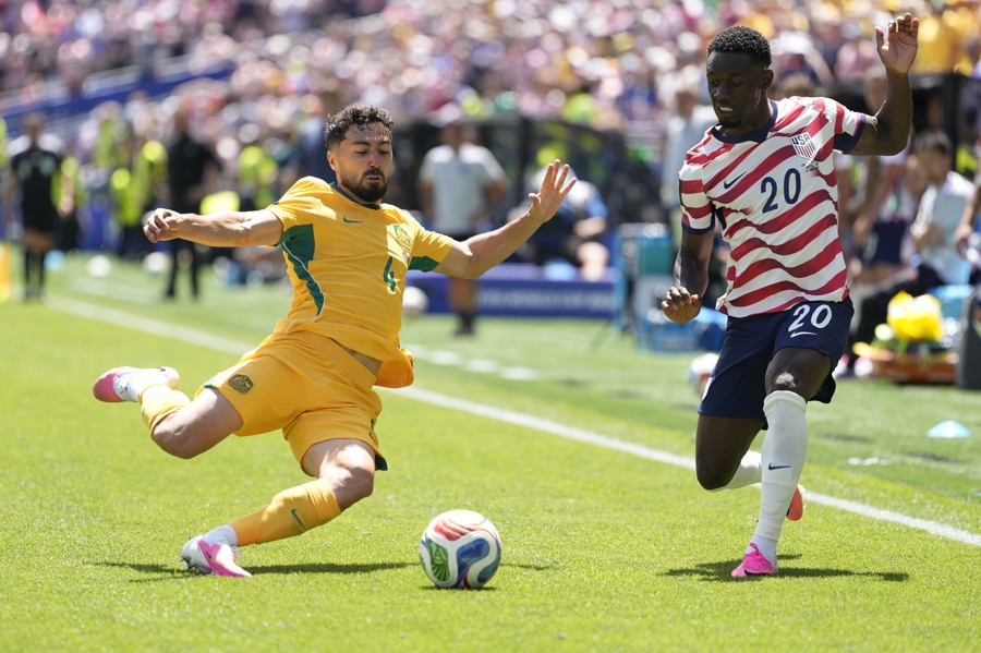 Jacob Italiano of Australia (L) and Folarin Balogun