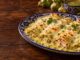 Enchiladas suizas cremosas y gratinadas Enchiladas suizas con salsa verde cremosa, pollo y queso gratinado, listas para compartir.