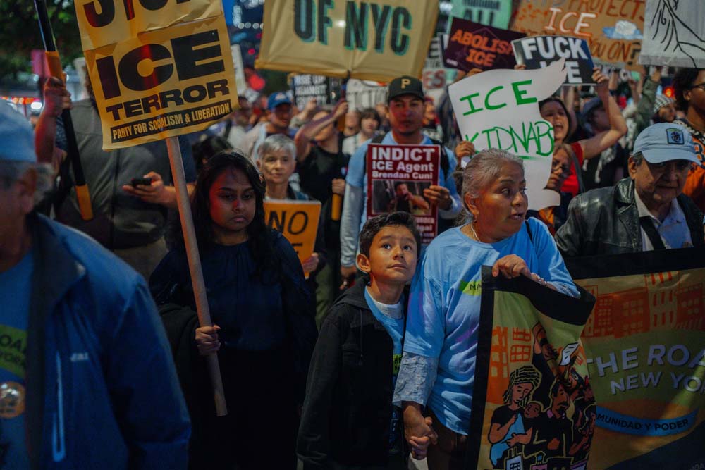 People rally against ICE after New York City shooting