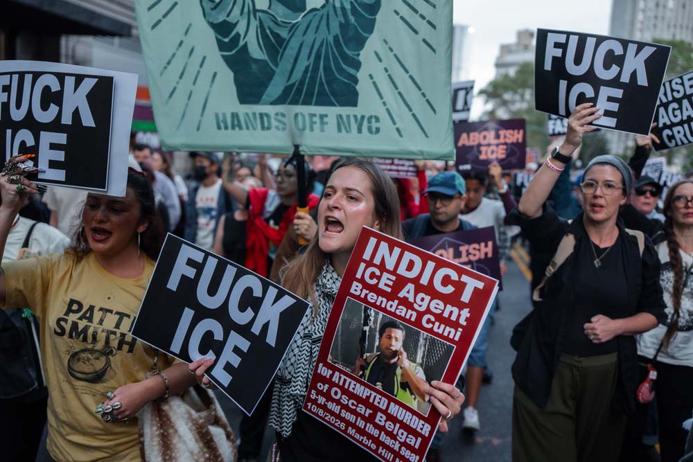 People rally against ICE after New York City shooting