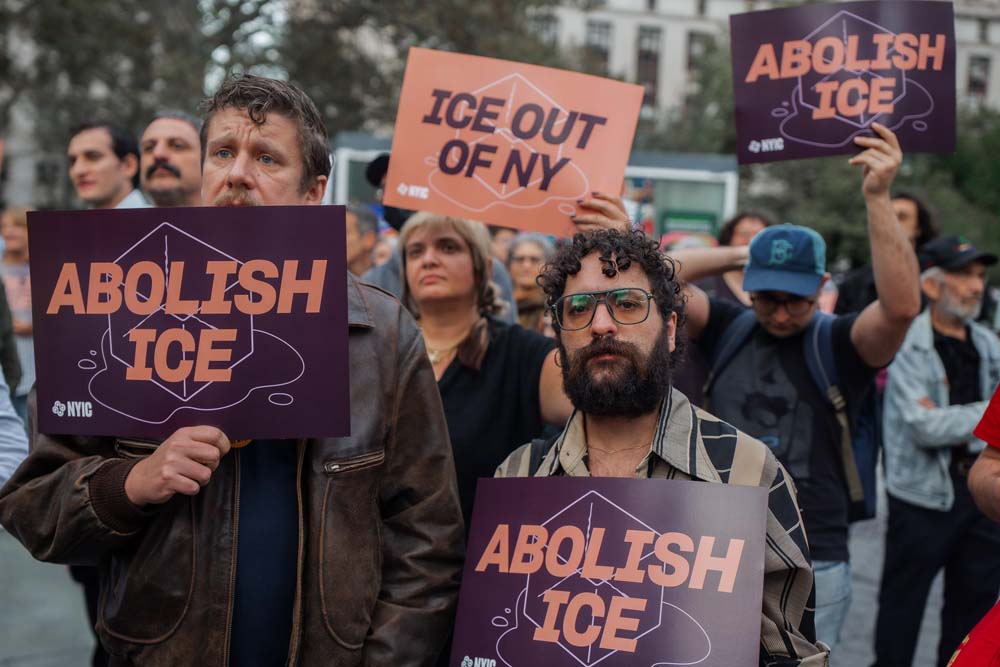 People rally against ICE after New York City shooting