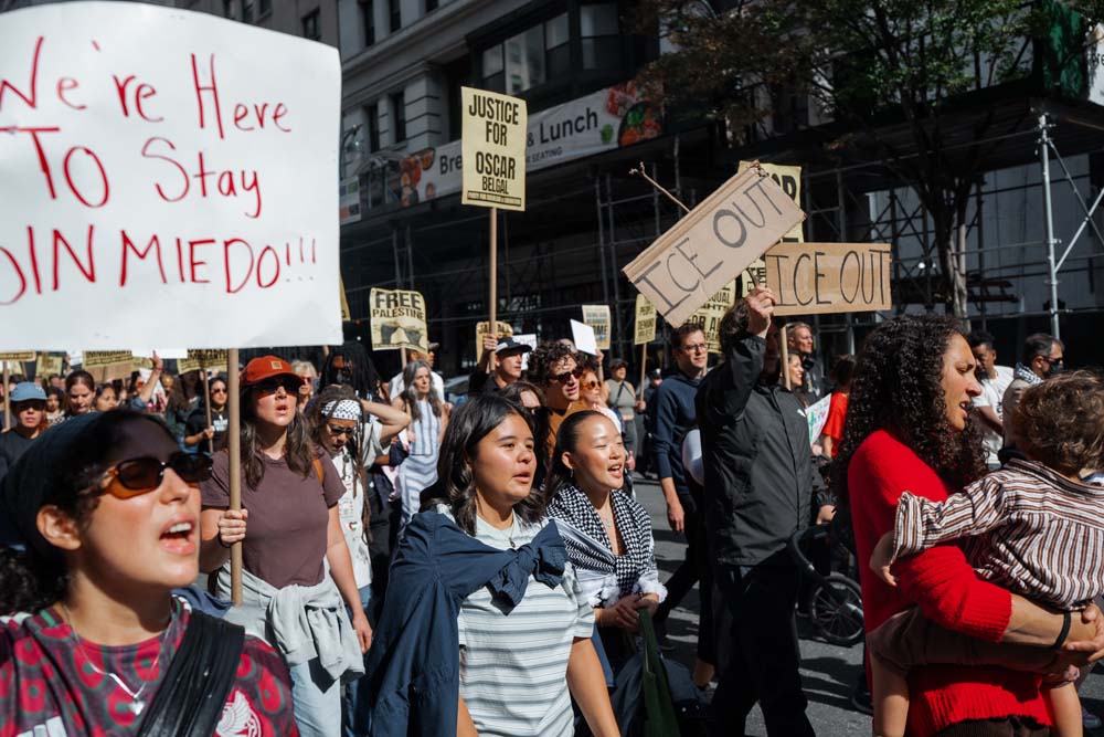 People rally against ICE after New York City shooting