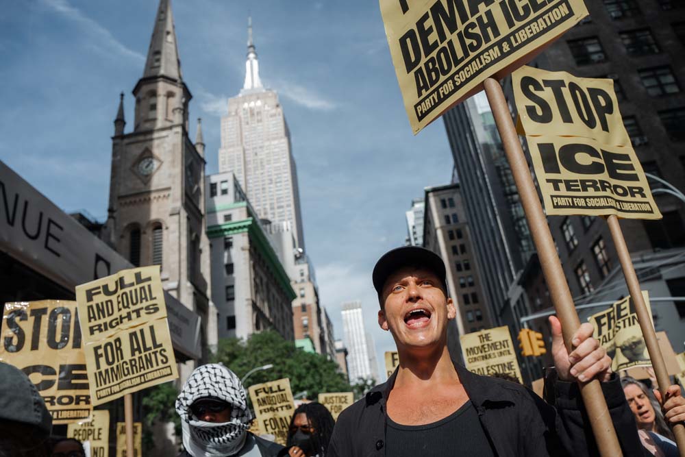 People rally against ICE after New York City shooting