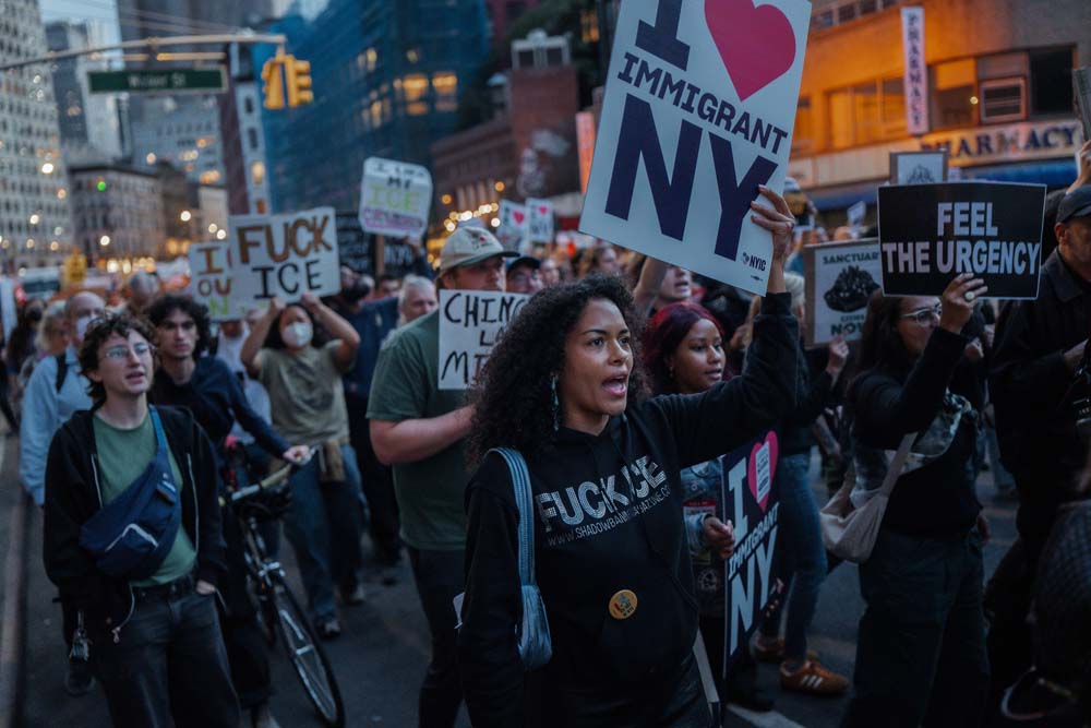 People rally against ICE after New York City shooting